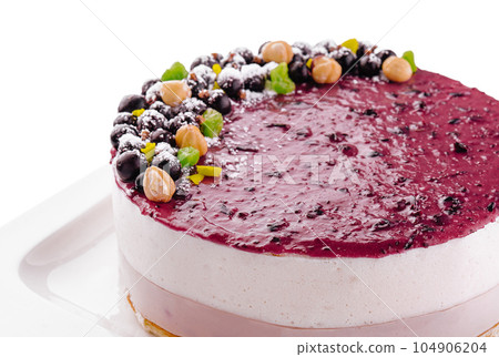 Sweet tasty cheesecake on white plate 104906204