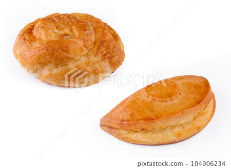 Bun with cottage cheese isolated on white background Bun with cottage cheese isolated on white background 104906234