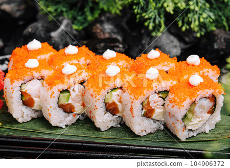 Sushi set with cheese, rice, shrimp, cucumber and caviar 104906372