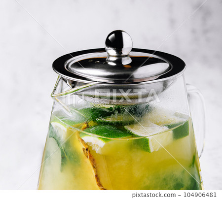Passionfruit iced green tea or lemonade with lime and mint Passionfruit iced green tea or lemonade with lime and mint 104906481