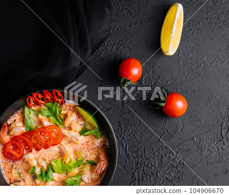Tasty Malaysian Soup with prawn and coconut milk Tasty Malaysian Soup with prawn and coconut milk 104906670