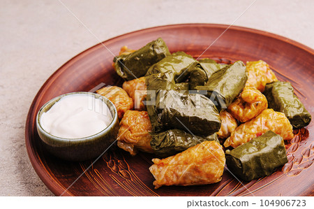 dolma cabbage rolls grape leaves filling close up dolma cabbage rolls grape leaves filling close up 104906723