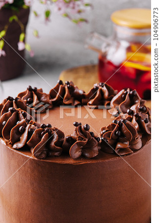 tasty homemade chocolate cake with tea 104906773