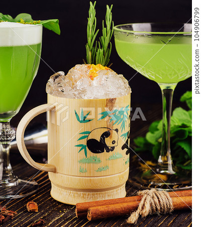 Fresh summer green basil cocktails in a glasses Fresh summer green basil cocktails in a glasses 104906799