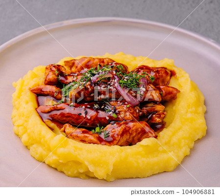 mashed potato with teriyaki sauce glazed tender beef cubes mashed potato with teriyaki sauce glazed tender beef cubes 104906881