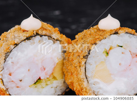 Warm rolls with shrimp closeup on black stone Warm rolls with shrimp closeup on black stone 104906885