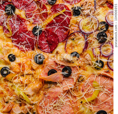composition with slices of different delicious pizzas composition with slices of different delicious pizzas 104906955