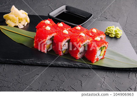 Sushi, rolls, California uramaki with tobiko caviar 104906963