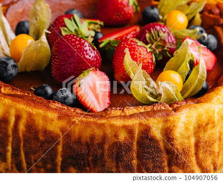 San Sebastian cheesecake with berries close up San Sebastian cheesecake with berries close up 104907056