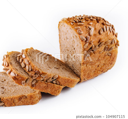 Sunflower seed bread slices isolated on white Sunflower seed bread slices isolated on white 104907115