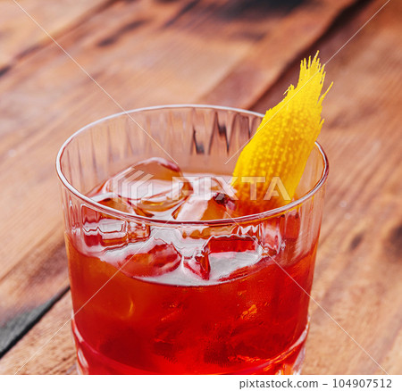 Refreshing summer drink with ice in a glass Refreshing summer drink with ice in a glass 104907512