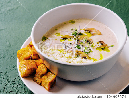 Soup puree with mushrooms and parmesan Soup puree with mushrooms and parmesan 104907674