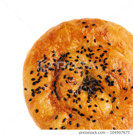 Fresh twisted bun with sesame seeds Fresh twisted bun with sesame seeds 104907675