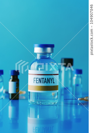 mock vial of fentanyl on a table mock vial of fentanyl on a table 104907846