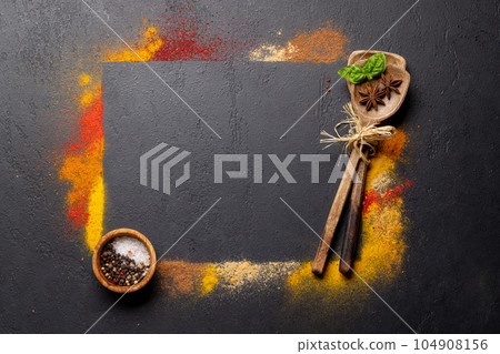 Various spices on stone table Various spices on stone table 104908156