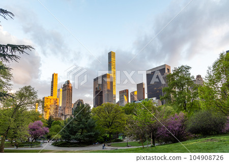 Manhattan skyscrapers and Central Park sunset Manhattan skyscrapers and Central Park sunset 104908726