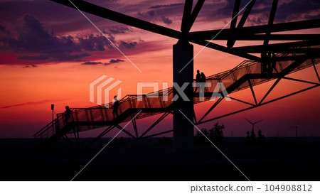 Viewing platform Tetraeder in Bottrop, Germany at sunset Viewing platform Tetraeder in Bottrop, Germany at sunset 104908812