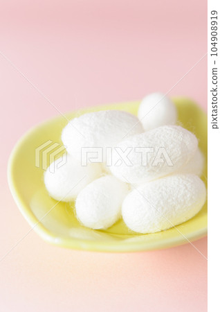 white cocoon balls on a plate white cocoon balls on a plate 104908919
