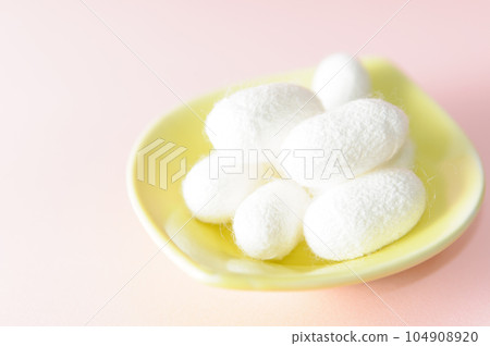 white cocoon balls on a plate white cocoon balls on a plate 104908920