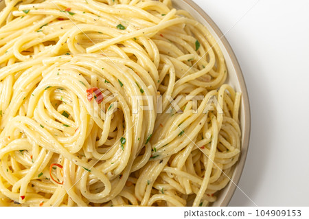Aglio e olio on a white background Aglio e olio on a white background 104909153
