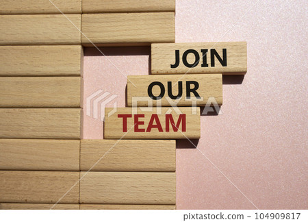 Join our team symbol. Wooden blocks with words Join our team. Beautiful pink background. Business and Join our team concept. Copy space. 104909817