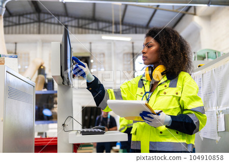 staff woman worker work operate cutting machine. Lathe CNC engineer. modern factory working woman. smart women worker industry workplace 104910858