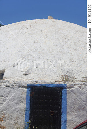 Traditional water cistern in Bodrum city. White round cellar, a traditional Turkish cellar Traditional water cistern in Bodrum city. White round cellar, a traditional Turkish cellar 104911102