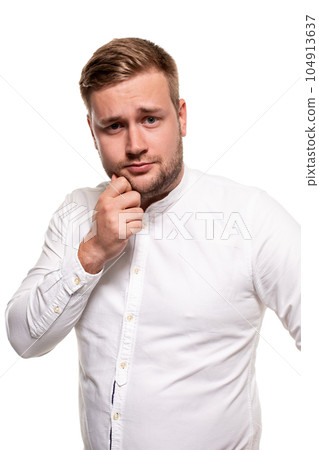 Close up horizontal portrait of a handsome man with a beard, stylish haircut, wearing a white shirt, isolated on a white background 104913637