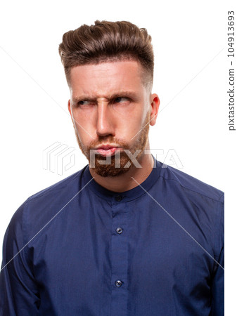 Attractive young man wearing blue shirt, isolated over a white background. 104913693