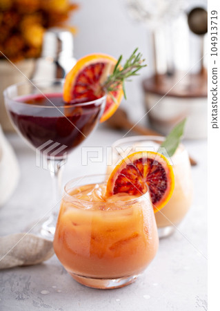 Winter and fall cocktails with blood oranges Winter and fall cocktails with blood oranges 104913719