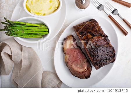 Sunday roast beef sliced on a plate 104913745