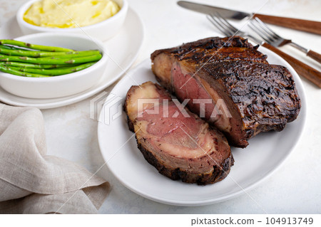Sunday roast beef sliced on a plate 104913749