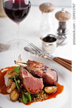 Roasted rack of lamb Roasted rack of lamb 104913767