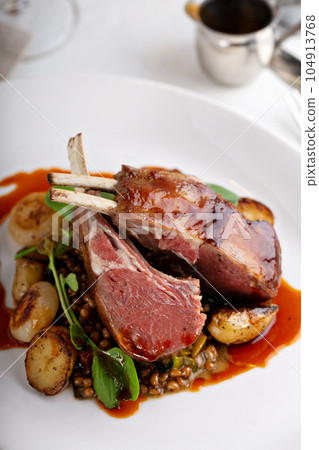 Roasted rack of lamb 104913768