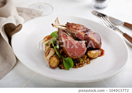 Roasted rack of lamb 104913772