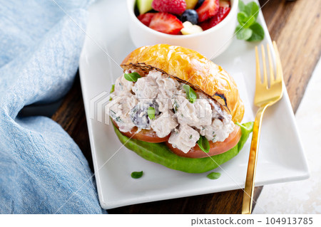 Croissant sandwich with potato salad 104913785