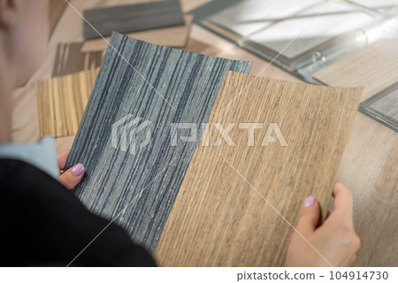 Choice of laminated chipboard for furniture production. Samples of imitation of valuable wood species for interior decoration and the production of author's furniture. Choice of laminated chipboard for furniture production. Samples of imitation of valuable wood species for interior decoration and the production of author's furniture. 104914730