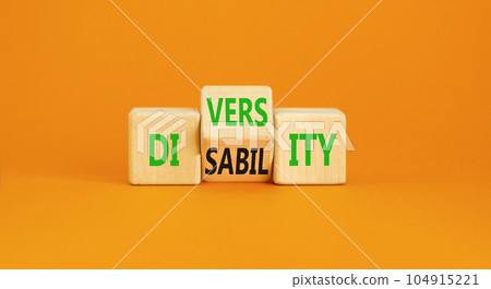 DEI Diversity or disability symbol. Concept words Diversity disability on wooden block. Beautiful orange table orange background. Business diversity disability concept. 104915221