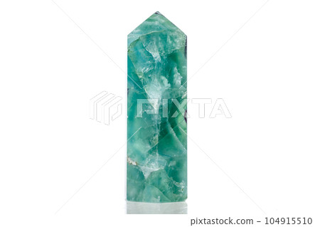 Macro mineral stone Fluorite crystal on a black background Macro mineral stone Fluorite crystal on a black background 104915510