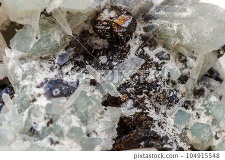Macro mineral stone Drusus quartz with sphalerite in the rock a white background 104915548