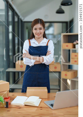 Online delivery, female small business owners are ecstatic when they see unexpected sales and customer orders in their business planning and marketing. 104915571