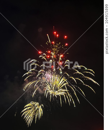 Night festive beautiful fireworks from different colors Night festive beautiful fireworks from different colors 104915899