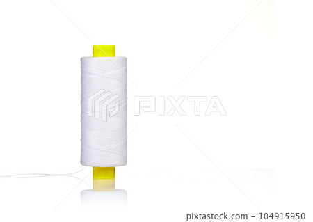 a skein of thread white colors macro on a white background a skein of thread white colors macro on a white background 104915950