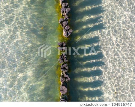Groynes on the beach at Zingst, Mecklenburg-West Pomerania, Germany Groynes on the beach at Zingst, Mecklenburg-West Pomerania, Germany 104916747