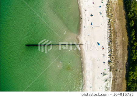 Groynes on the beach at Zingst, Mecklenburg-West Pomerania, Germany 104916785