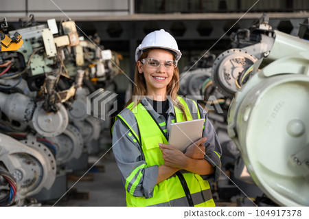 Maintenance engineer worker working with robotic machine automation 104917378