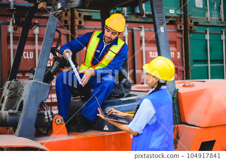 Industrial engineer worker working at overseas shipping container yard Industrial engineer worker working at overseas shipping container yard 104917841