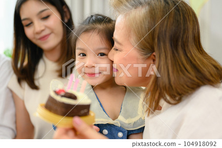 Happy and cheerful family spending good time together at home 104918092