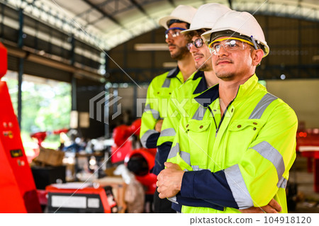 Group of professional mechanical engineer team checking and repairing engine Group of professional mechanical engineer team checking and repairing engine 104918120