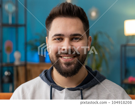 Happy calm man smiling friendly, glad expression, feel satisfied concept good news, celebrate win 104918208